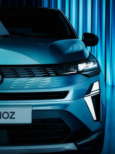 Renault Symbioz - grille met meerdere kleine Renault-diamanten 
